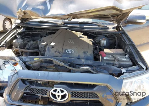 2014 Toyota Tacoma Base V6 из США, поврежденный, VIN 3TMMU4FN2EM064447